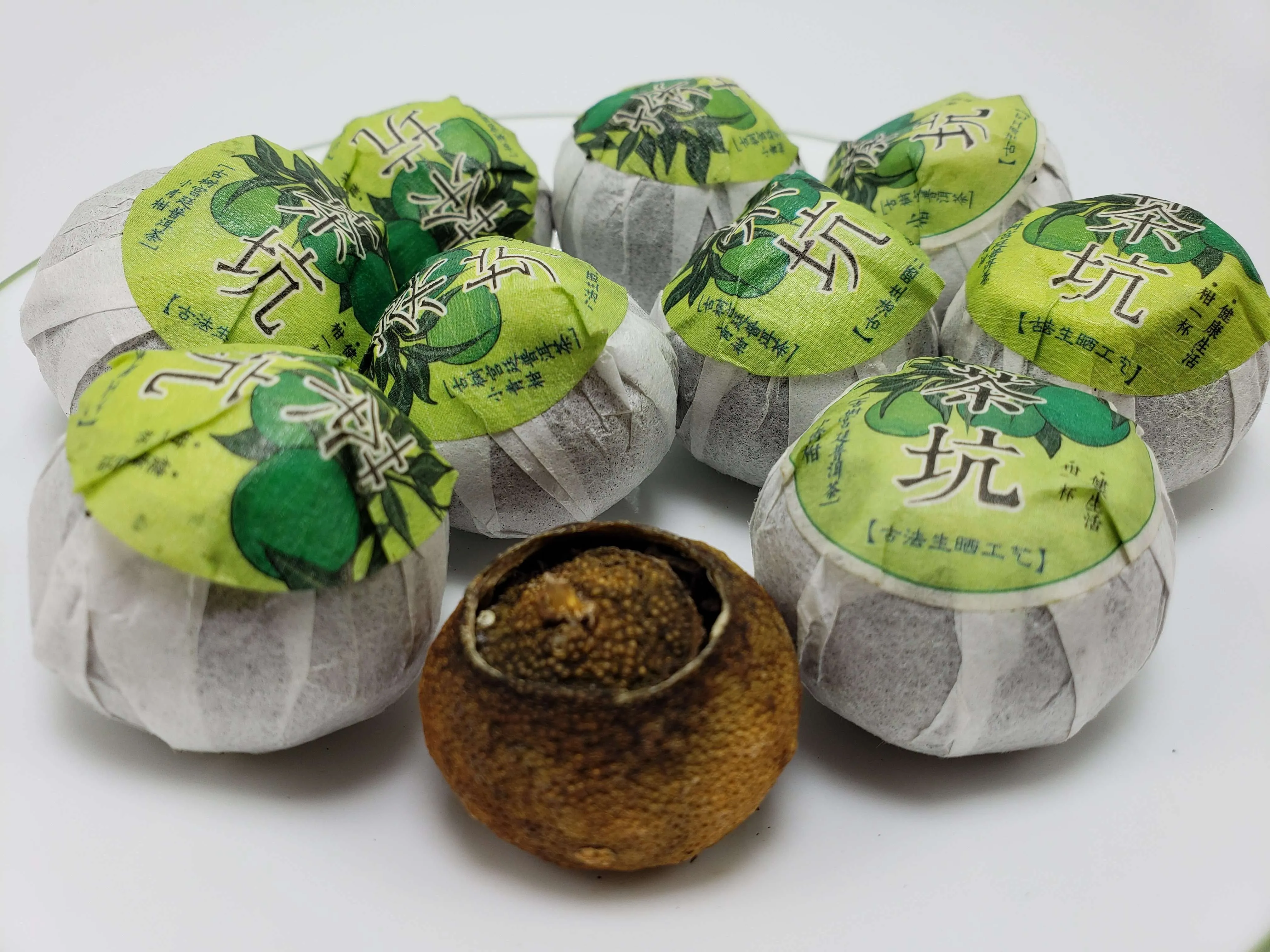 Pu'er Fermented Tea Inside Green Mandarin Orange (ripe Pu'er tea)